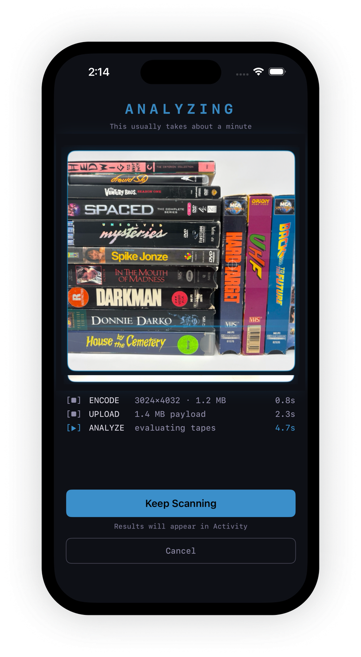 Scanning a mixed shelf of DVDs and VHS tapes with the Rewind app