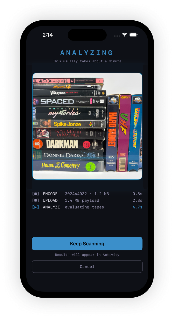 Scanning a mixed shelf of DVDs and VHS tapes with the Rewind app